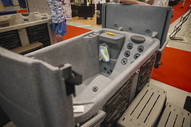 Eco Spa E2 controls, headrest, and hydrotherapy jets